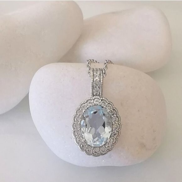 Diamond halo around Sky Blue Topaz pendant necklace - Picture 9 of 9